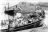 Foto nalatenschap W. Visser. Het Fries jacht Zwaluw (in 1924 tjotter Zwaluw) (NJR blz. 254) en de rondvaartboot (motorboot) Iris van de Firma Visser uit Paterswolde (NJR blz.109)